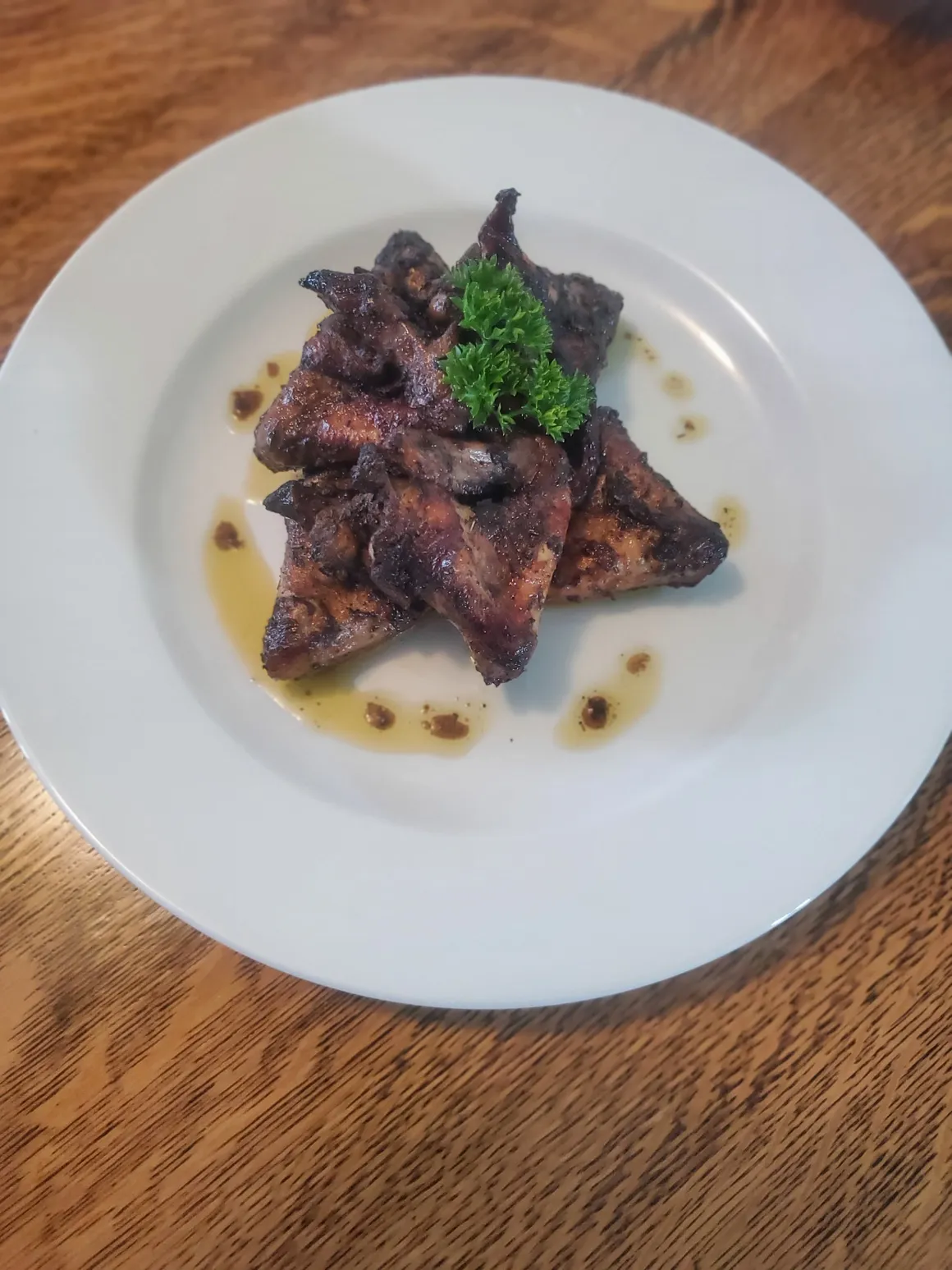 Wings Garnished With Parsley - Wadadli Flare Catering
